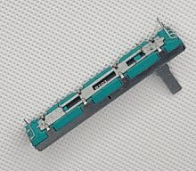 Резистор переменный движковый  10 кОм стерео 60х9х7 мм (линейность B) SL4580GH зелено-синий